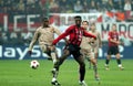 Samuel Eto`o and Clarence Seedorf  in action during the match Royalty Free Stock Photo